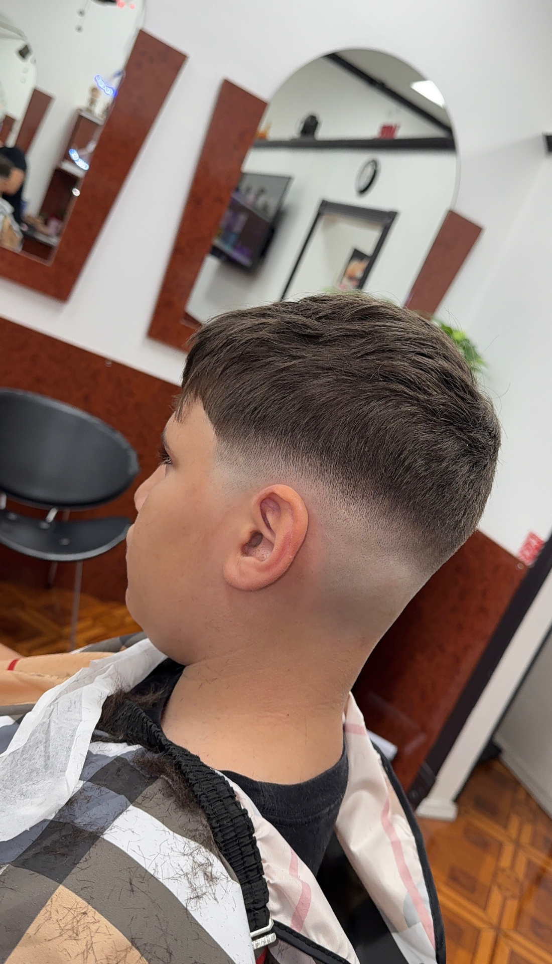 Boy's mid skin fade with textured crop top