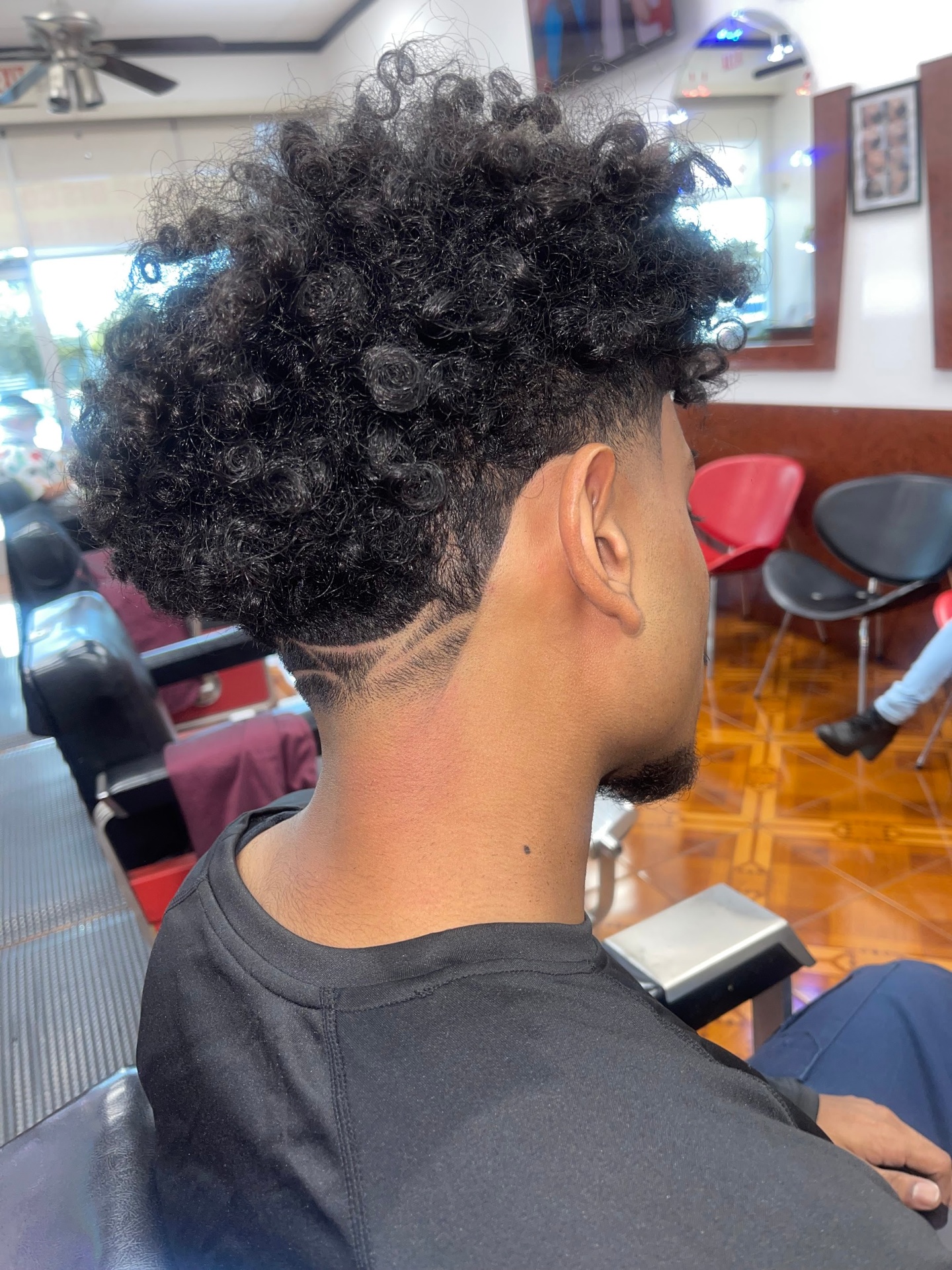Curly afro top with taper fade and shape-up