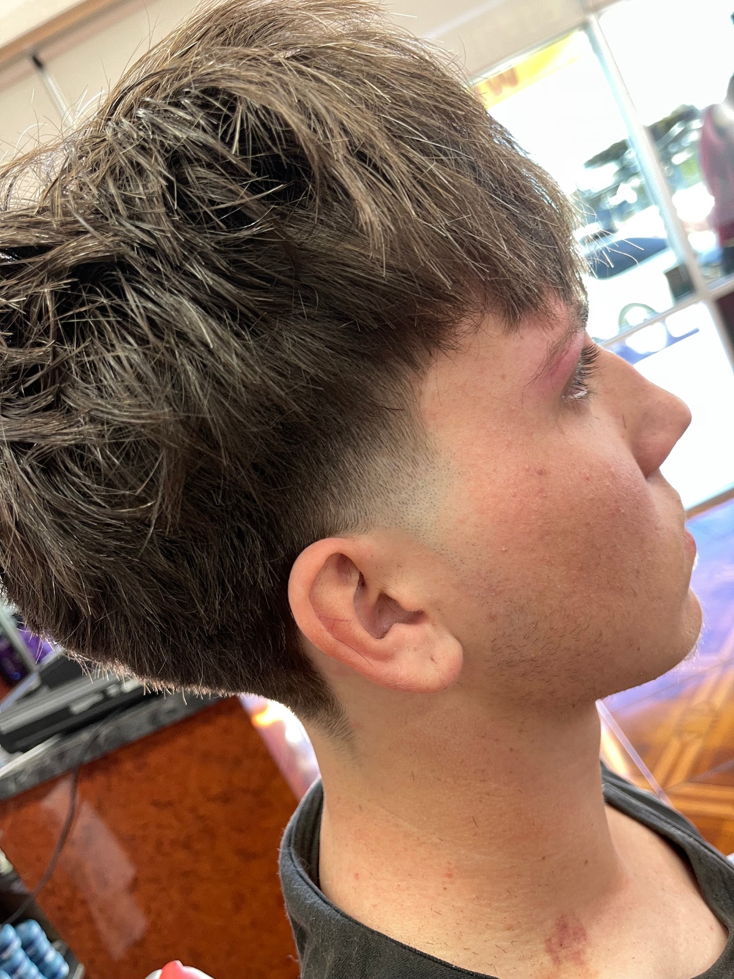 Textured men's cut with low taper fade